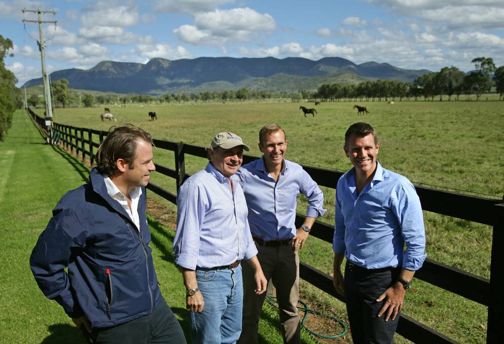 VISITORS: Coolmore's Tom Magnier and Darley's Henry Plumtre talk to NSW Planning Minister Rob Stokes and Premier Mike Baird last year. 