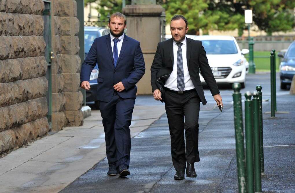 Joby Rowe (left) arrives at the Supreme Court in Bendigo for his child homicide trial with lawyer, Alex McLennan. Picture: NONI HYETT

