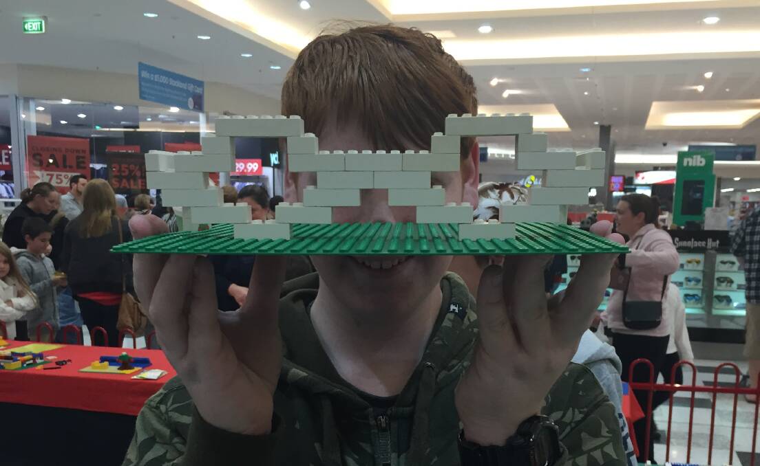 Ryan Scott with his Lego glasses creation.