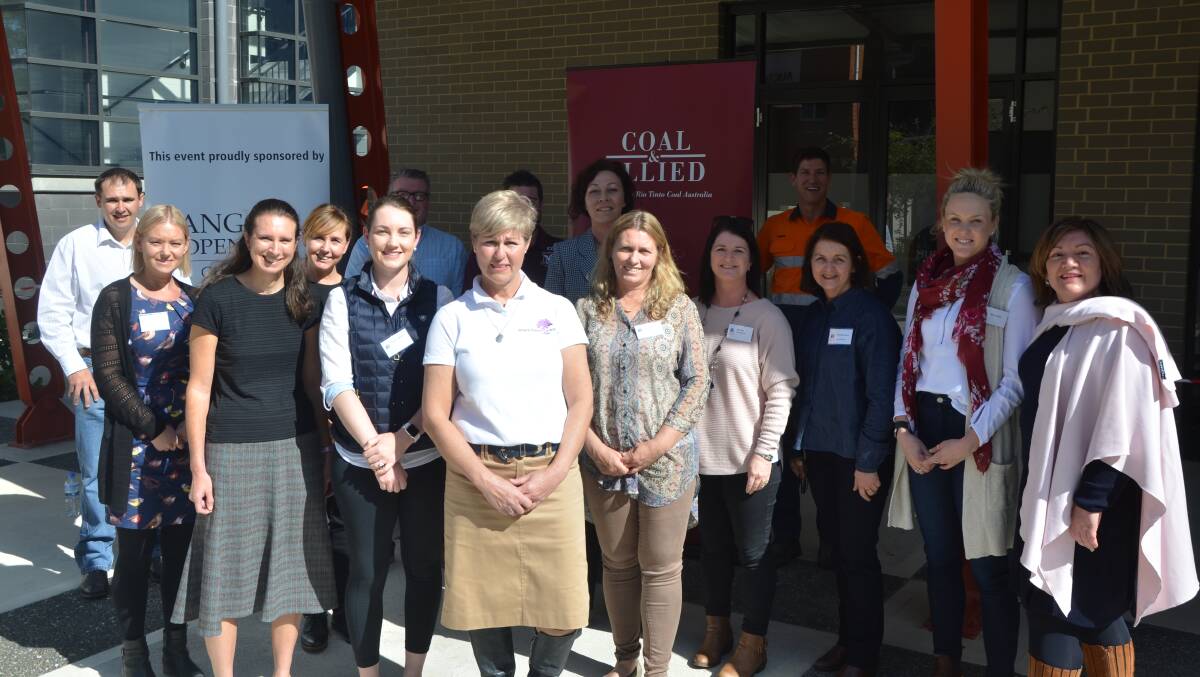 Melbourne University’s Dr Peggy Kern, Where There’s A Will co-founder Pauline Carrigan, Glencore’s Nathan Lane and Coal & Allied’s Andrew Speechly with teachers from Muswellbrook Shire schools on Friday.