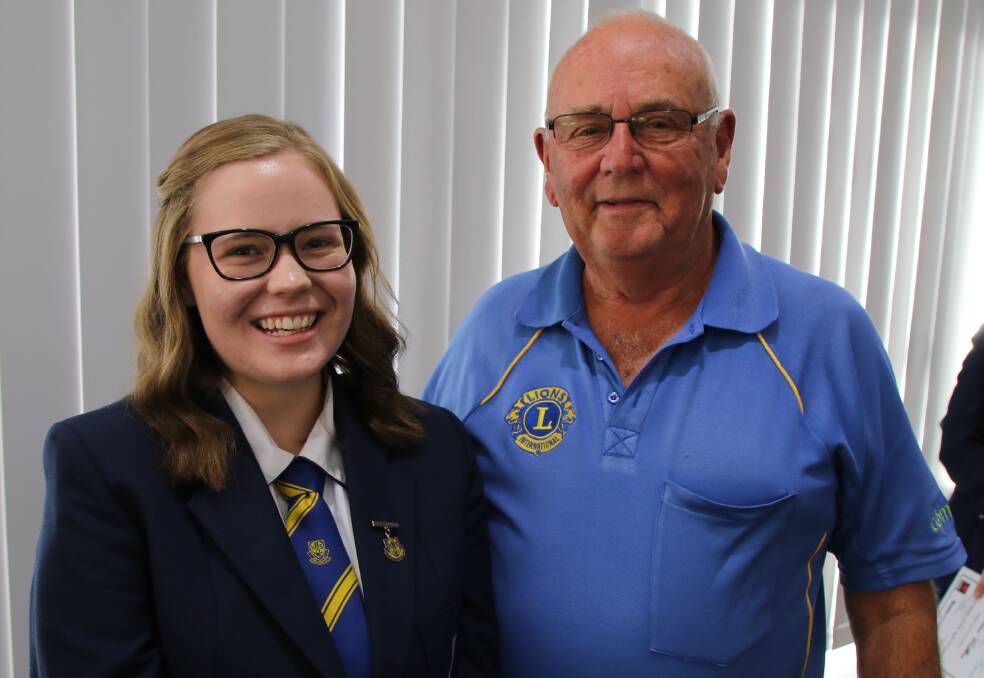 TRIUMPH: Muswellbrook Lions 1st vice-president Rod Upton with regional winner Imogen O’Leary.