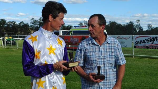 MUSWELLBROOK BOUND: Trainer Mark de Montfort (right) returns to the Skellatar Park racetrack on Tuesday.