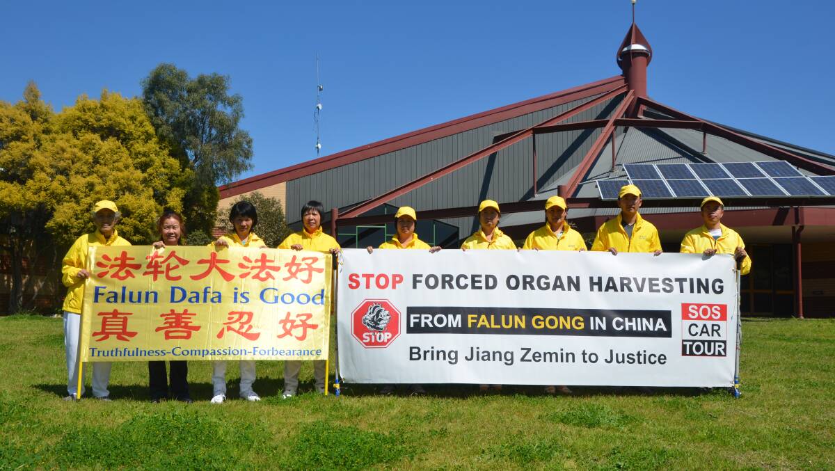 RAISING AWARENESS: A group of Falun Gong practitioners, who are hoping to stop their persecution and organ harvesting in China, share their stories in Muswellbrook on Monday. 