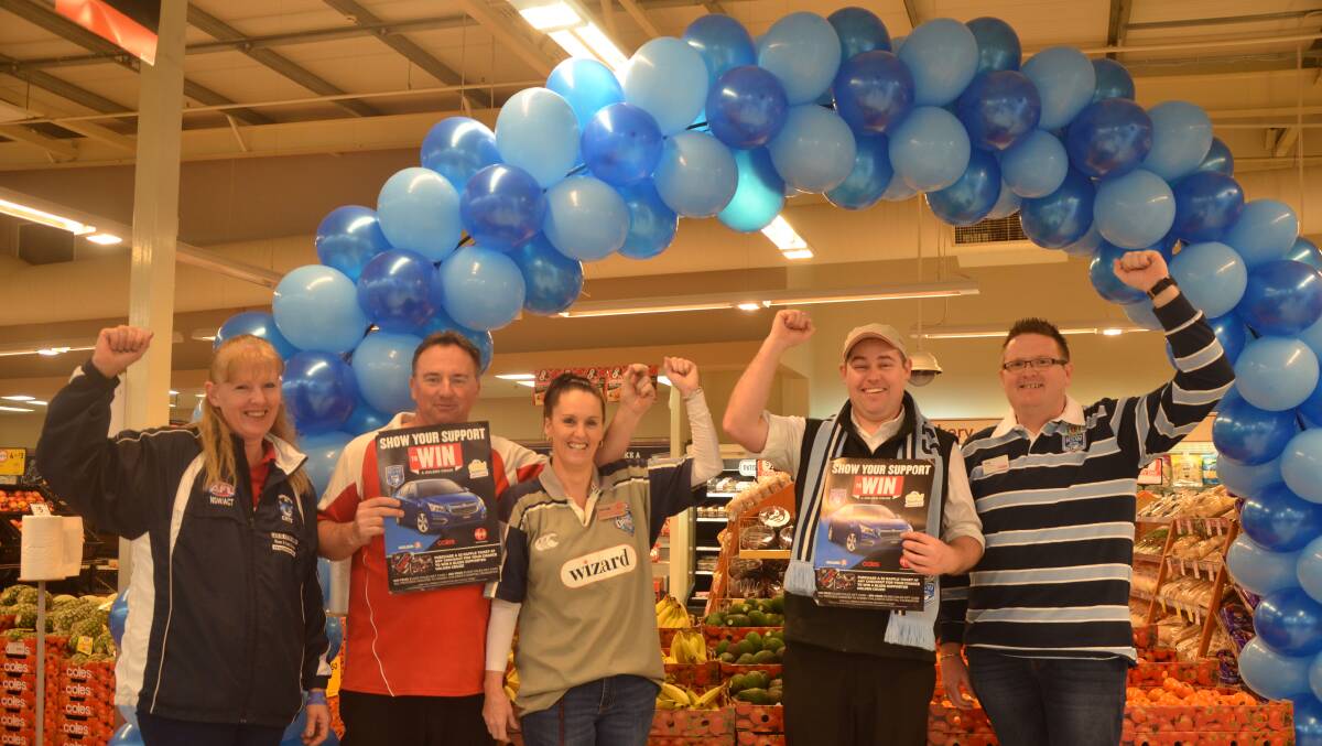 BLUE FEVER: Coles Muswellbrook employees Jenny Page, Paul Watts, Lorena Howard, Andrew Sales and Phil Winkler are throwing their support behind the NSW State of Origin team.