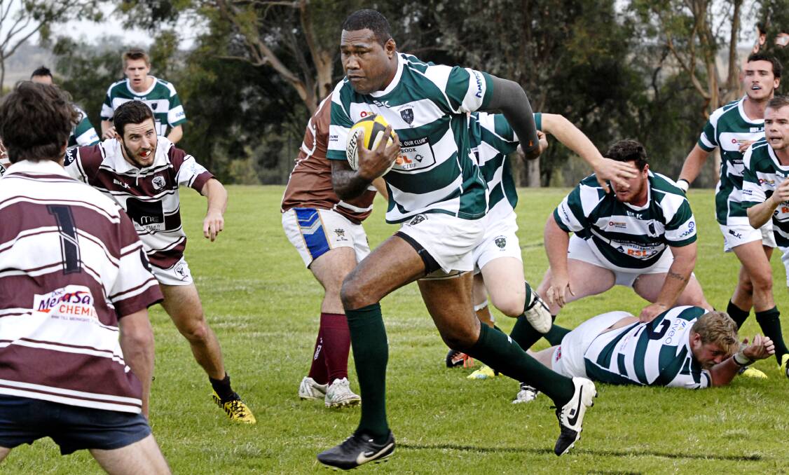 CROWD FAVOURITE: Muswellbrook Heelers stalwart Bruce Raque takes on the defence in a recent outing.