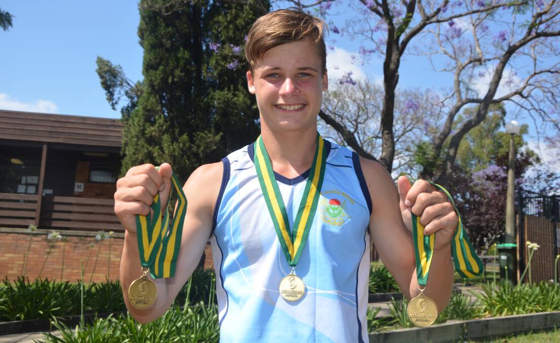 CHAMPION: Muswellbrook Public School Year 6 student Brody Perry proudly displays his gold medals from the NSW PSSA National Championships.
