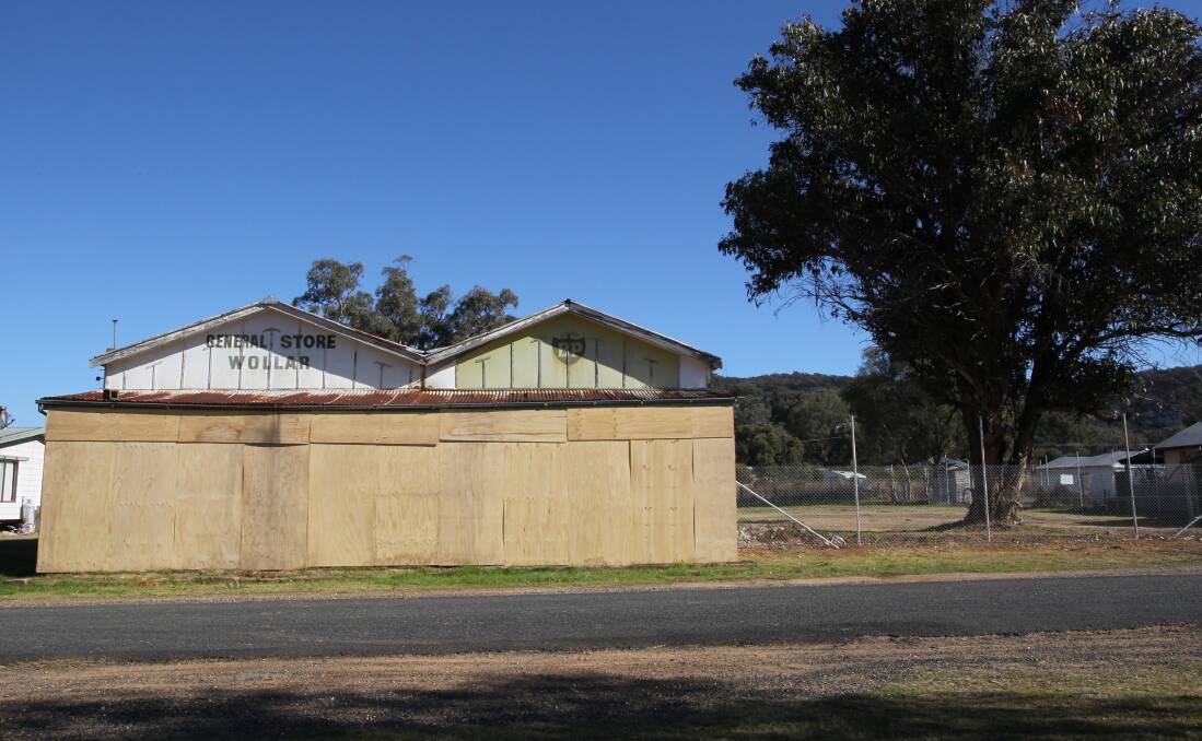 BOARDED UP: The Wollar general store in 2011. When the Wilpinjong Coal Project started, in 2006, it was suggested the mine would strengthen the community. 