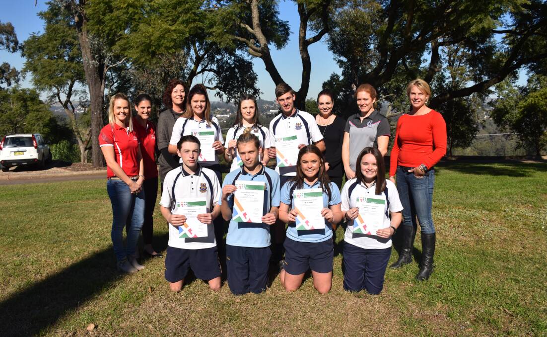 IMPORTANT LESSON: Teen Mental Health First Aid participants with UHCS Rebecca Eveleigh and Mel Atkinson, Muswellbrook High School principal Elizabeth Bate, head teacher wellbeing Narelle Smith, girls advisor Sally Bowe, and facilitator Sarah Green.