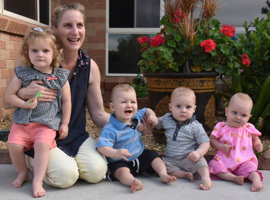 SUPER MUM: Kylie Lawson with daughter Ranelle, 2, and triplets George, Henry and Laura, 12 months.