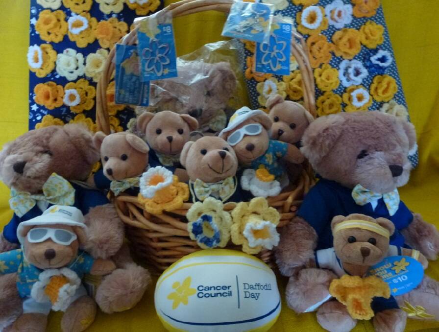 YELLOW: Some of the items Muswellbrook residents can buy on Friday for Daffodil Day 2016.