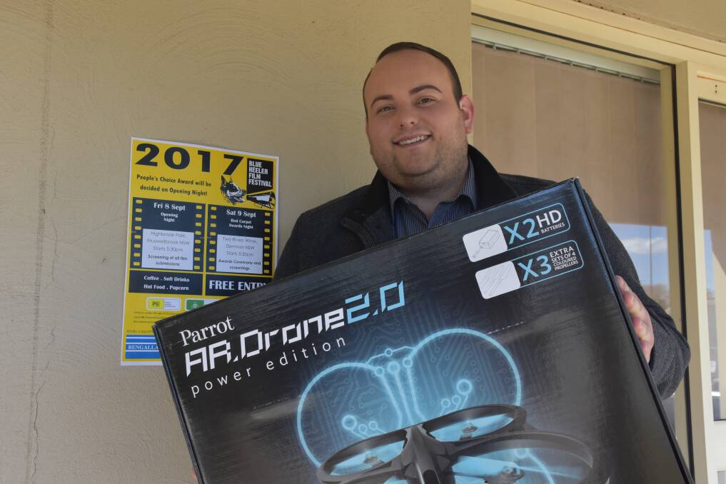 READY: Muswellbrook Shire Council's Tourism and Events Officer Ruaan Van Der Wath with the senior prize - a drone with camera. Other prizes - a HP Laptop, a NikonD3400, Samsung Tablet, and a GoPro.