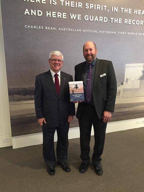GREAT MOMENT: Professor David Horner of the Australian National University, editor of The Official History of Australian Peacekeeping, Humanitarian and Post-Cold War Operations, with author and researcher Doctor Steven Bullard, at the official launch in Canberra.