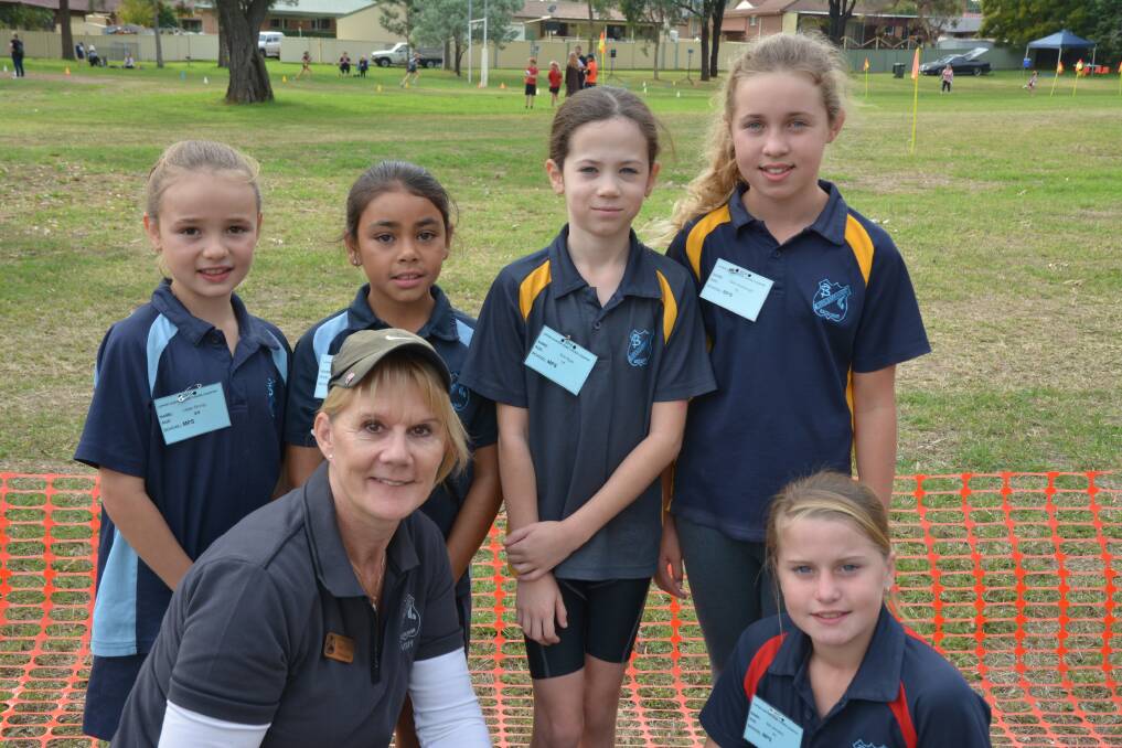 EDUCATION: New Muswellbrook Public School principal Joan Stephens with students Lillian Strong, Mikayla Edwards, Erin Ryan, Zahli Woolnough, and (front) Isla Johnston.