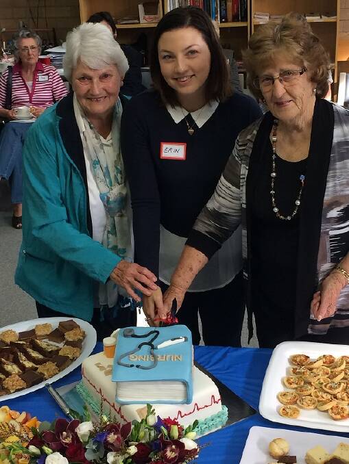 GENERATIONS: The longest trained nurses present, Margaret Delforce and Helen Blake; and the most recently graduated nurse, Erin Thomson, who started her degree in 2013, cut the cake.