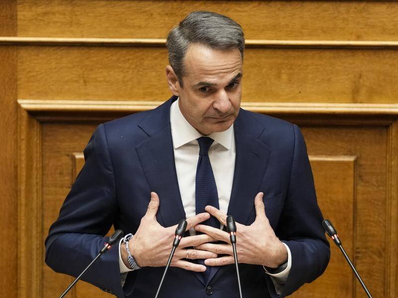 The government of PM Kyriakos Mitsotakis was accused of "trying to hide the truth" about the crash. (AP PHOTO)
