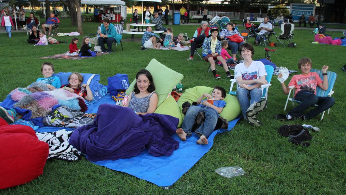 SET UP: Friends Jackson Collins, 11, Abbey Passfield, 13, Lara Collins, 13, Max Collins, 9, Riley Collins, 15, and Silas Tym, 12, were set up early for Sunday nights outdoor movie event.
