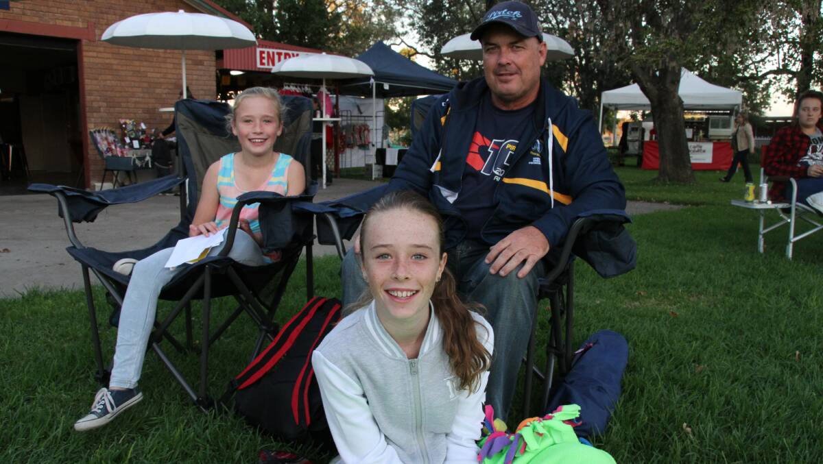 FAMILY TIME: Eve, 8, Gary, and Matilda Jones, 11, from Muswellbrook were out to support the first night of the Blue Heeler Film Festival at Muswellbrook Race Club.