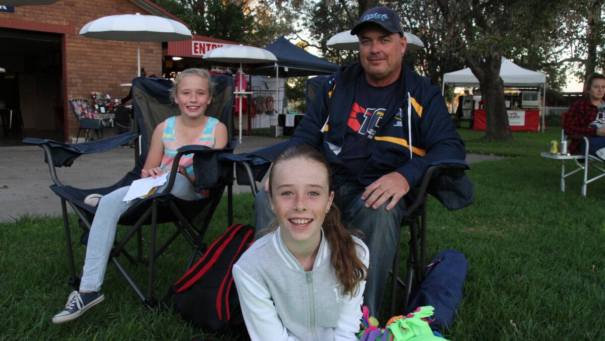 FAMILY TIME: Eve, 8, Gary, and Matilda Jones, 11, from Muswellbrook were out to support the first night of the Blue Heeler Film Festival at Muswellbrook Race Club.
