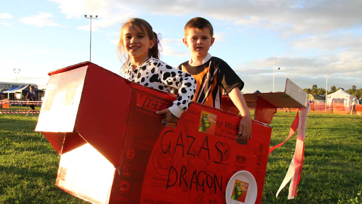 REV IT UP: Six-year-olds Lilly Mears and Harry Foot enjoyed racing in the box car derby.