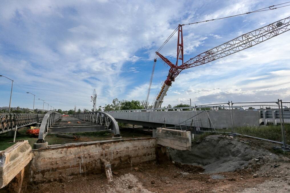 Two 500-tonne capacity German-made Liebherr cranes were "bumped in" days before the Fitzgerald Bridge was removed.  Photo: Darren Daly, Lightbox Imageworks, with permission of Roads and Maritime Services (RMS).