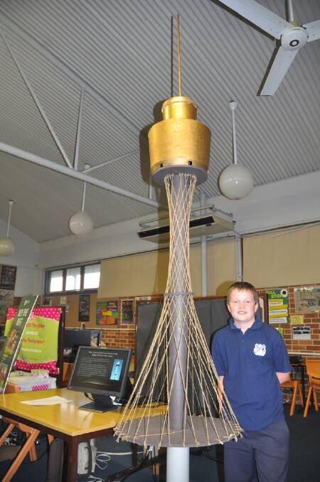 REACHING NEW HEIGHTS: Muswellbrook Public School's Nicholas Walsh made a Sydney Tower-inspired bird feeder so cats couldn't catch the hungry birds.