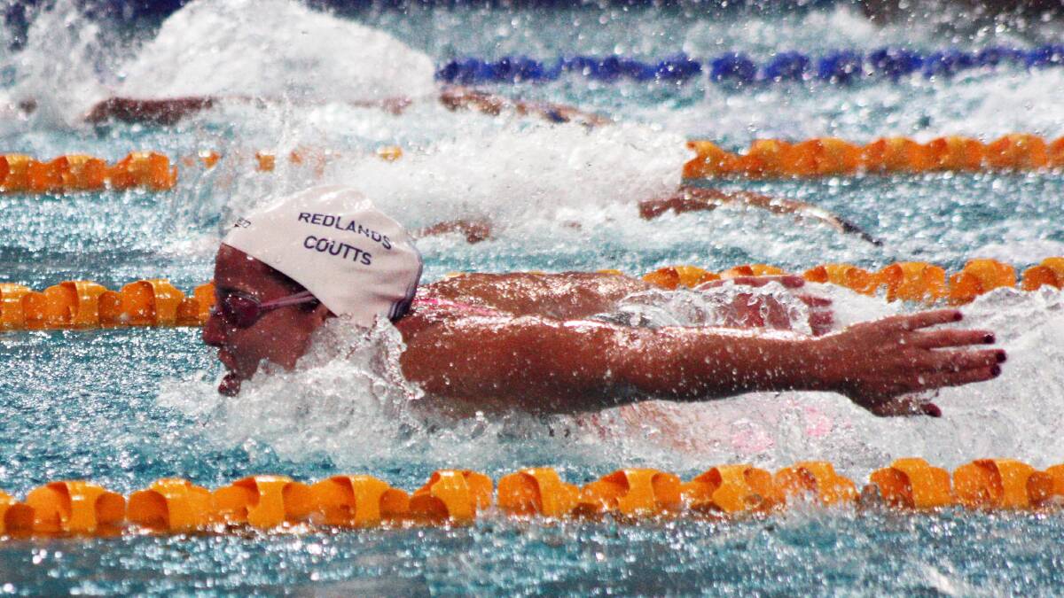 CHAMPION: Alicia Coutts competes in the final of the womens 100 metre butterfly event during the 2014 Australian Swimming Championships trials at Chandler