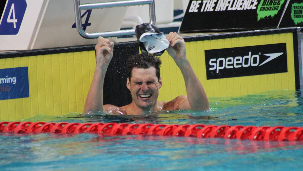 Queenslander Christian Sprenger wins the 100m breaststroke. 
Photo by Chris McCormack