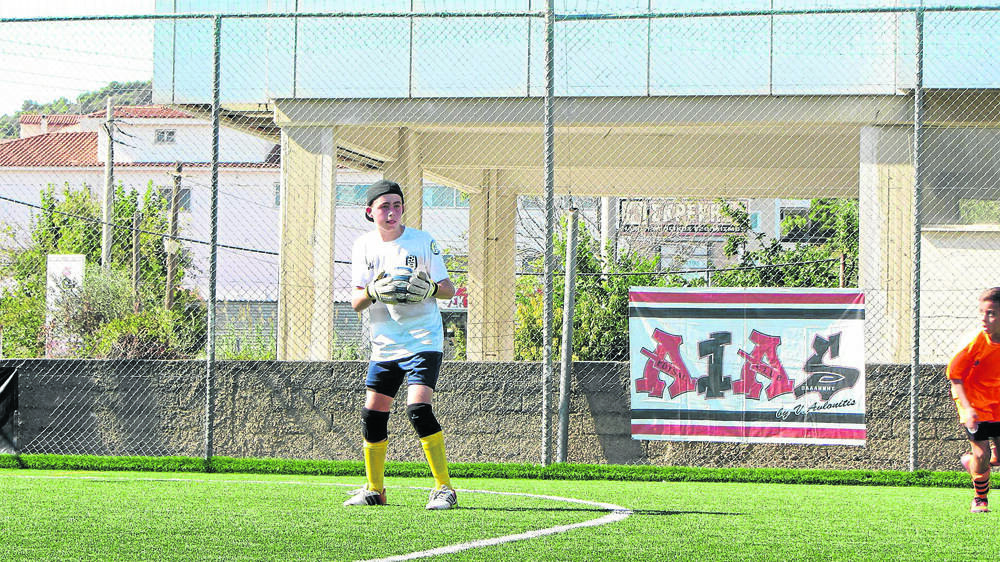 GRATEFUL: St Joseph’s, Aberdeen student Finn McLoughlin in a match during the recent Greek tour.