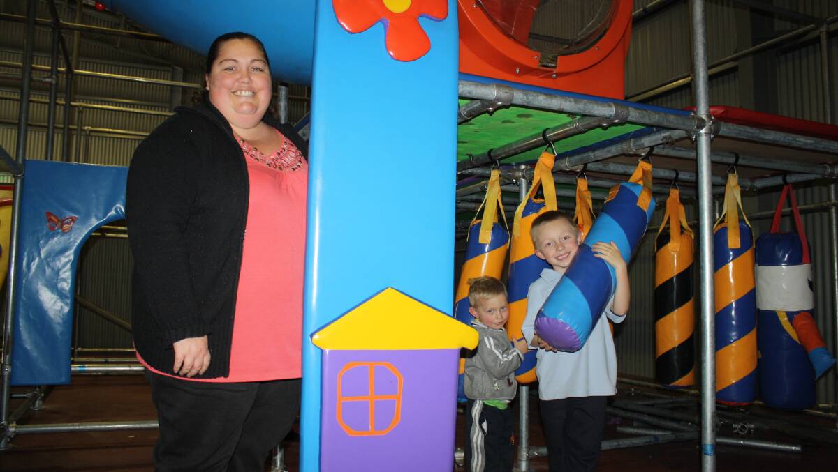 KIDS’ ZONE: Tracey Marsden with her sons Tyler, 5, and Mason, 3, show off part of the Little Rascals Playhouse.