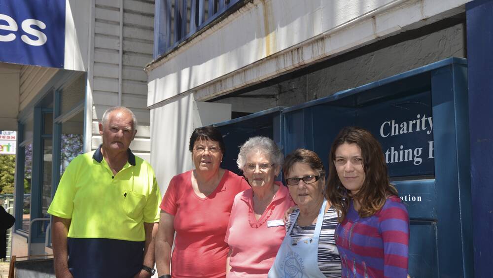 UPSET: Ray Tuchin, manager Carol O’Brien, Margaret Smith, Carmel Fackender and Sharna Woodward outside the Muswellbrook St Vincent de Paul shop this week.