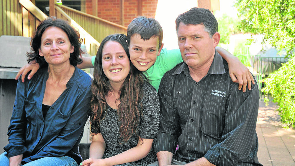 SUPPORT: Rachel Henderson (centre) with her mother Elizabeth, brother Chris and father Sean.