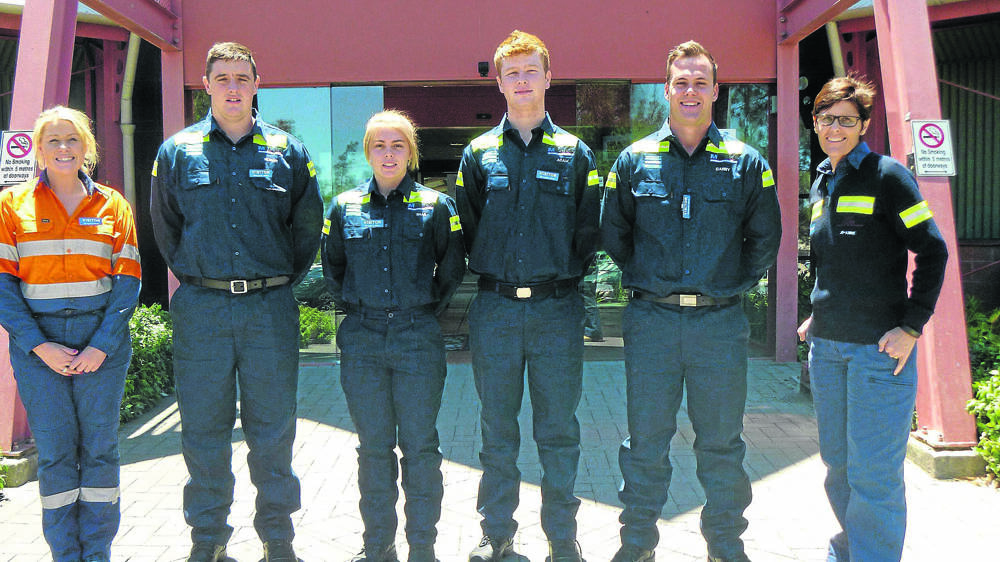 CONGRATS: From left, MIGAS field officer Angela Gardner with new apprentices Rohan Pottinger, Shae Pemberton, Adam Prowse and Darby Guiterrez, Bengalla general manager operations Jo-Anne Scarini.