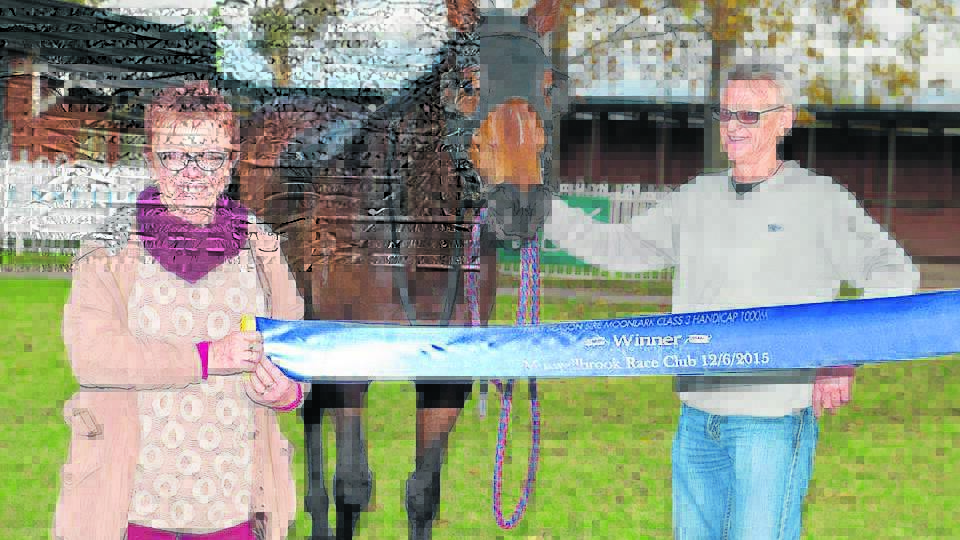 UPLIFTING: Liz and Greg Campbell with Charge of Light after the horse took out the First Season Shire Moonlark Class Three 1000m. Pic: KATRINA PARTRIDGE