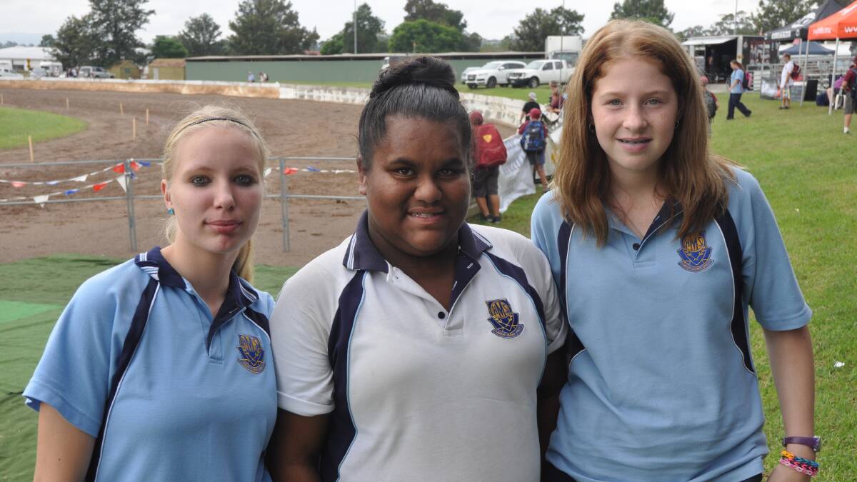 SHOW TIME: Muswellbrook High School students Britney Schubert, Te Ami Edwards, Angelica Say at the Upper Hunter Show today.