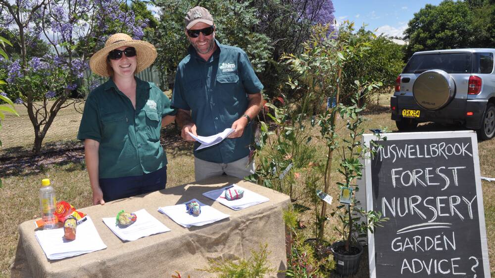 GET PLANTING:   Manager of Muswellbrook Forest Nursery, Sheloni Doyle, with her Nursery Assistant, John Galloway, hand out Fact Sheets to passers-by wanting to learn more about the importance of native trees in a 
sustainable garden.