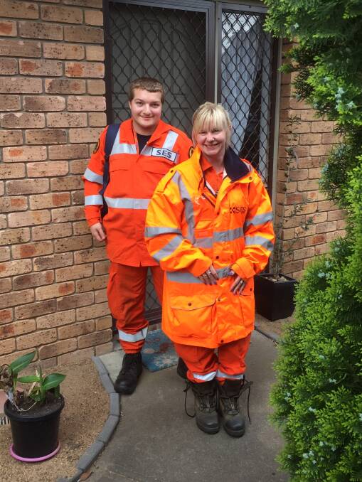 READY FOR WORK: Hayden Maas and Jess McDonald on their way to help with the State Emergency Service.