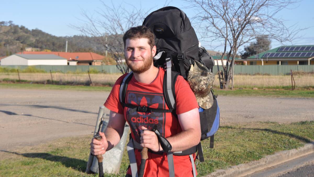 ADVENTUROUS: Joel Willems walked through Aberdeen on Tuesday after staying overnight in Muswellbrook.