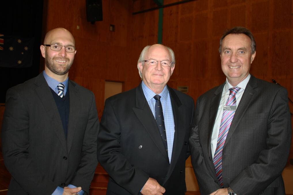AUGUST: HIGH HONOUR: Director for Public Education NSW Mark Young was humbled to have met Laurie Holdsworth (centre) at the Education Week Awards night last week. Joining them was Muswellbrook High School principal Gareth Erskine (left).
