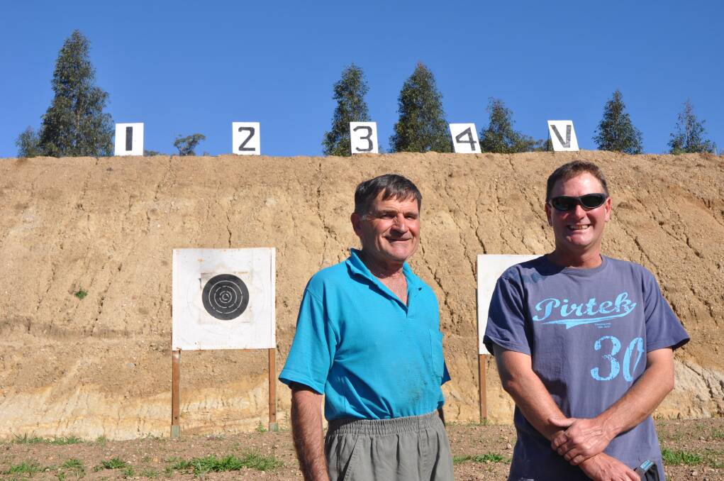 DECEMBER: SETTING THEIR SIGHTS: Aberdeen Rifle Club’s outgoing club captain Kevin Muffett and current  captain Michael Moore at the new 600-yard range, which will be officially opened on Sunday.