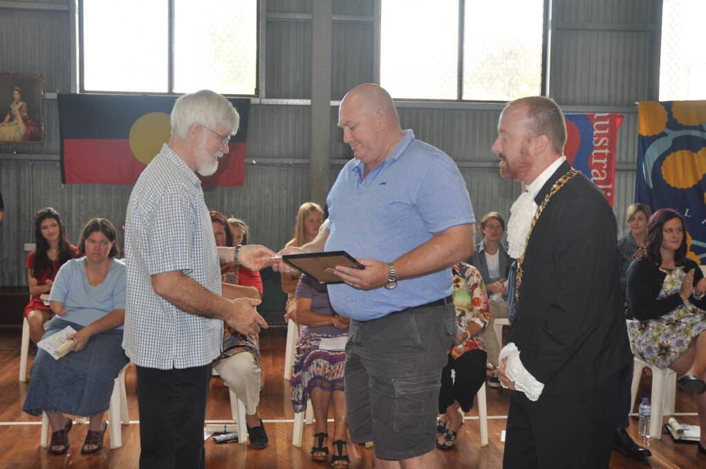 GOOD SPORT: Russell Esdaile and Muswellbrook Shire mayor Martin Rush presented Bruce Honeysett (centre) with the Services to Sport of the Year award.