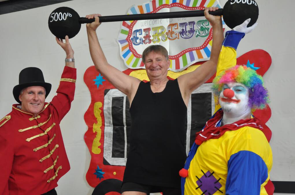 MAY: ROLL UP, ROLL UP:NuCoal general manager and ringmaster Glen Lewis and clown Andrew Matthews give Black Coal Ball organiser Joe Matthews a helping hand as the trio launched the 10th anniversary of the Muswellbrook charity fundraiser this week.
