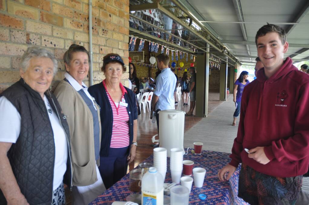 TEA FOR ONE: (l-r) Muswellbrook CWA president Mary Bowman, vice president Jan Wild and member Joy Baxter, were on hand to provide those attending the Muswellbrook Shire Australia Day celebration, including Josh Barry, with a warm cuppa.