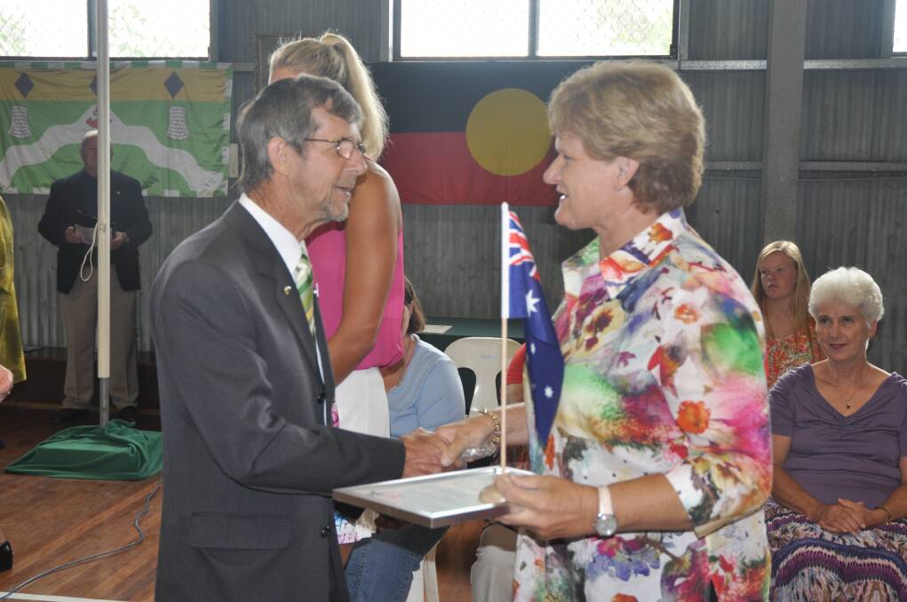 TOP CITIZENS: 2013 Muswellbrook Citizen of the Year Graham Turvey congratulates 2014 Citizen of the Year Jenny Hinschen.