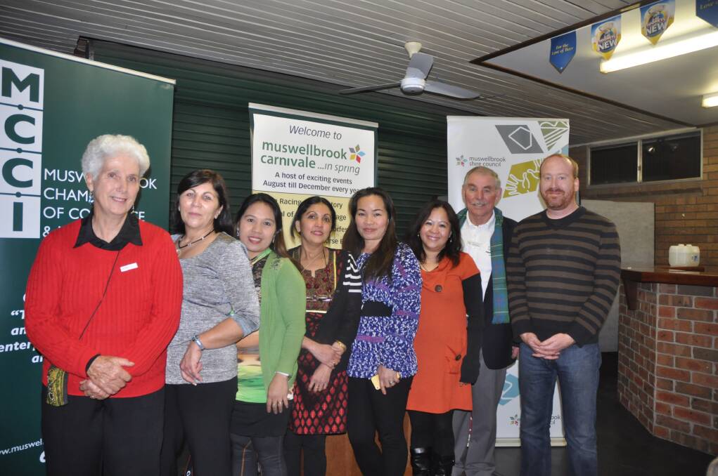CULTURAL DIVERSITY: Muswellbrook's Global Care Multicultural Ladies Group members, from left, Heather Boyton, Marta Martinez, Merlyn Ferries, Ha Lee, Arti Trasi, JJ Yumang, Muswellbrook Shire tourism and promotions officer Kevin Doherty and Muswellbrook Shire mayor Martin Rush at last week’s Carnivale in Spring launch.