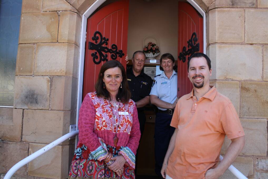 DECEMBER: OPENING THE RED DOOR: Ready to help those less fortunate enjoy a Christmas lunch are Upper Hunter Community Services community  development coordinator Marina-Lee Warner, Muswellbrook RSL Club CEO Darryl Egan, Hunter Valley Local Area Command community liaison officer Sheree Grey and Muswellbrook Uniting Church pastor Richard Moors.