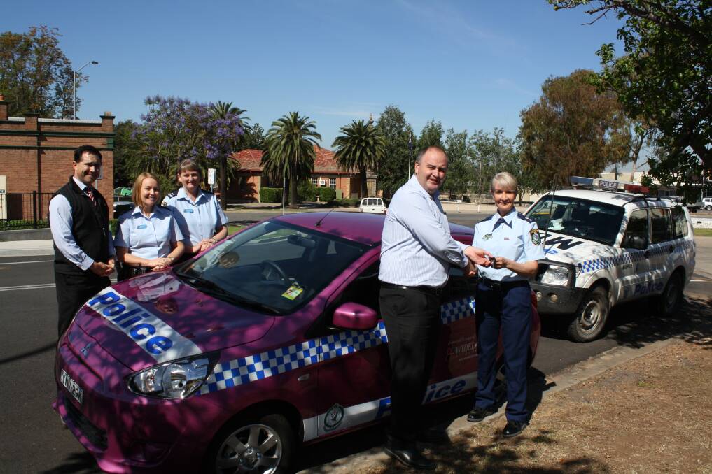 NOVEMBER: NOT LIKE THE OTHERS: Hunter Valley Local Area Command Superintendent Jodie Shepherd receives the keys for the sponsored Mitsubishi Mirage from Wideland Motor Group general manager Sam Dawson as Mitsubishi salesman Troy Jackson and senior constables Kate Hobson and Sheree Gray watch on.