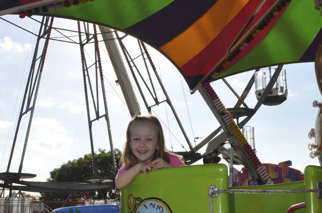 MARCH: IT'S SHOW TIME: The show kicked off at Muswellbrook Showground this morning and with a mix of old favourites and new attractions, there promises to be something to please show-goers of any age, including three-year-old Bridie Smith.