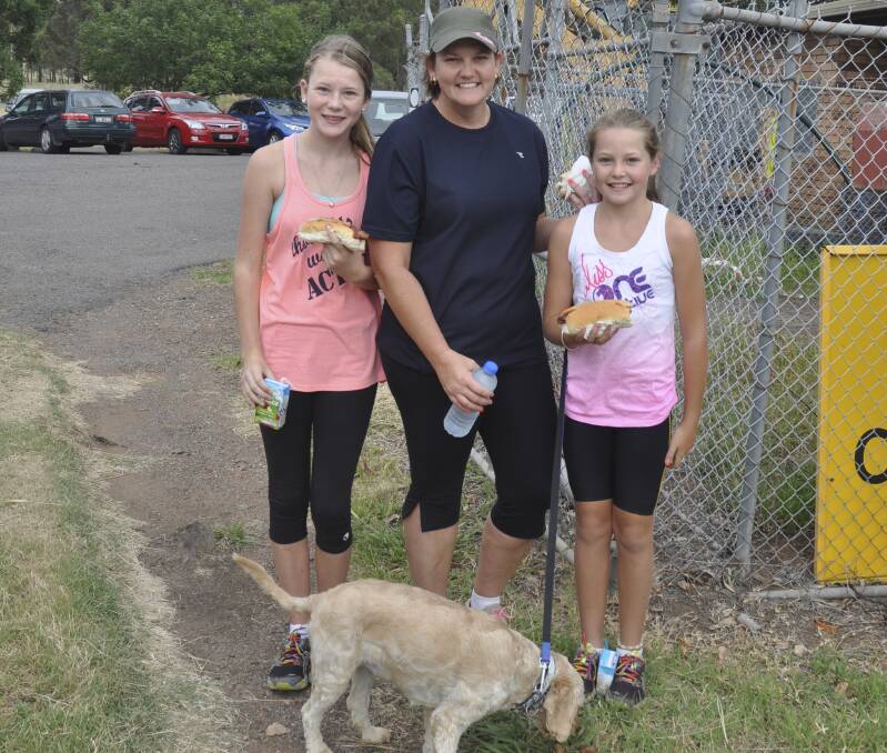 MORNING WALK: Lauren, Debbie and Sarah Mitchell took their dog Darcy for an Australia Day walk.