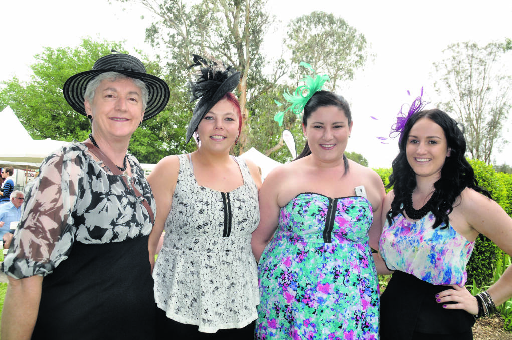 AFTERNOON IN THE SUN: Robyn Green (Toronto), Ally Holland-Wright (Muswellbrook), Amelia Green (Bathurst) and Hayley Collins (Muswellbrook) at the big Cup meeting on Tuesday.