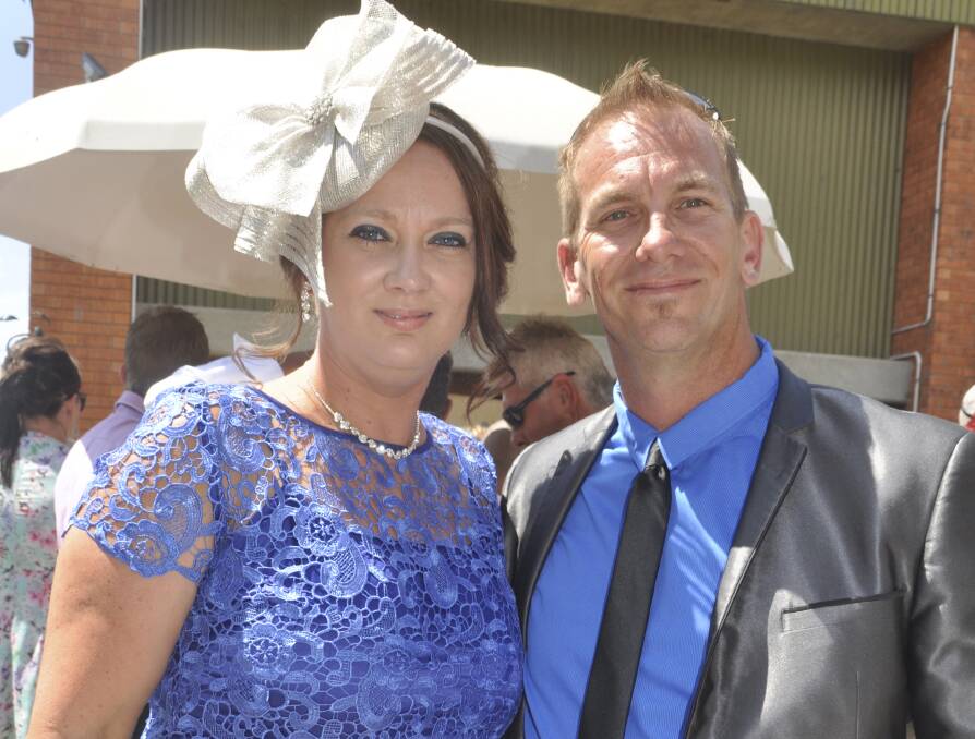 DASHING DUO: Kerrie and Darryl Woodeson, of Muswellbrook, soak up the atmosphere at Skellatar Park on Tuesday.